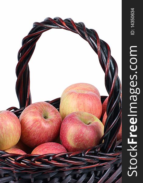 A basket of red apples on white background