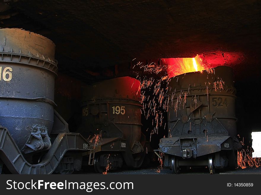 Liquid iron from the smelting stove. Liquid iron from the smelting stove.