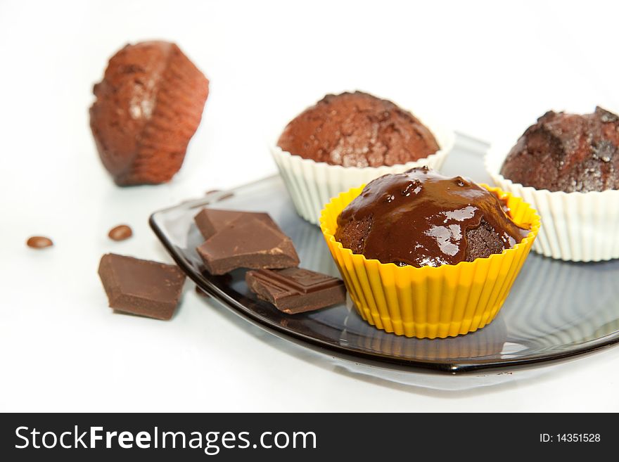 Chocolate muffins with coffee beans and chocolate