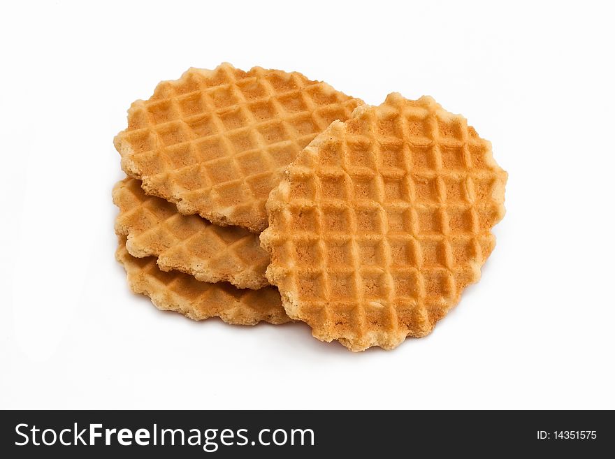 Four waffles isolated on white with shadow