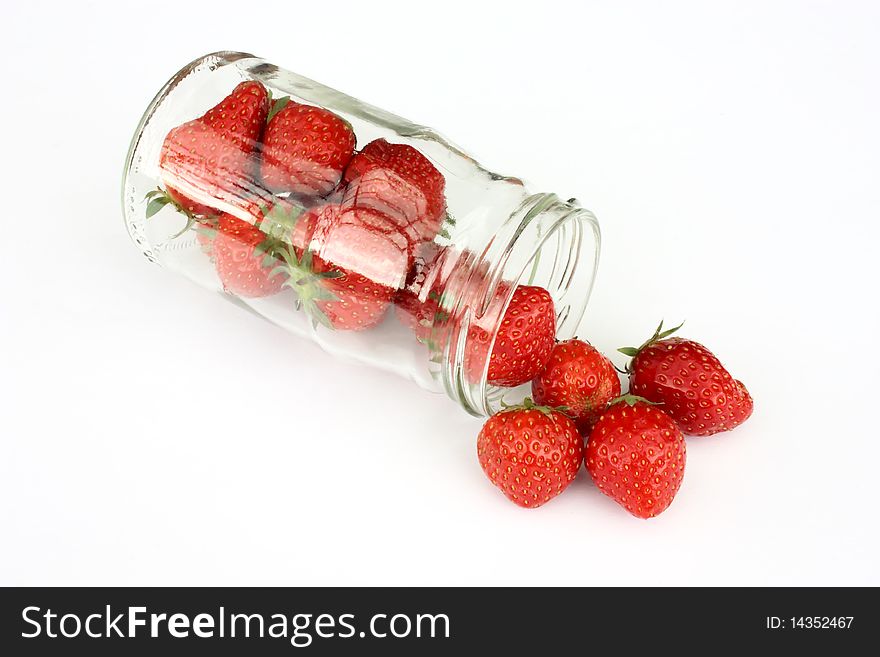 Strawberries in jar isolated on white background