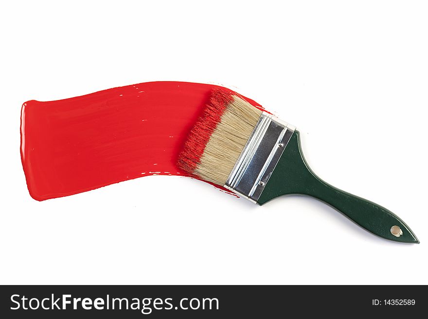 Painting red with paint brush on white