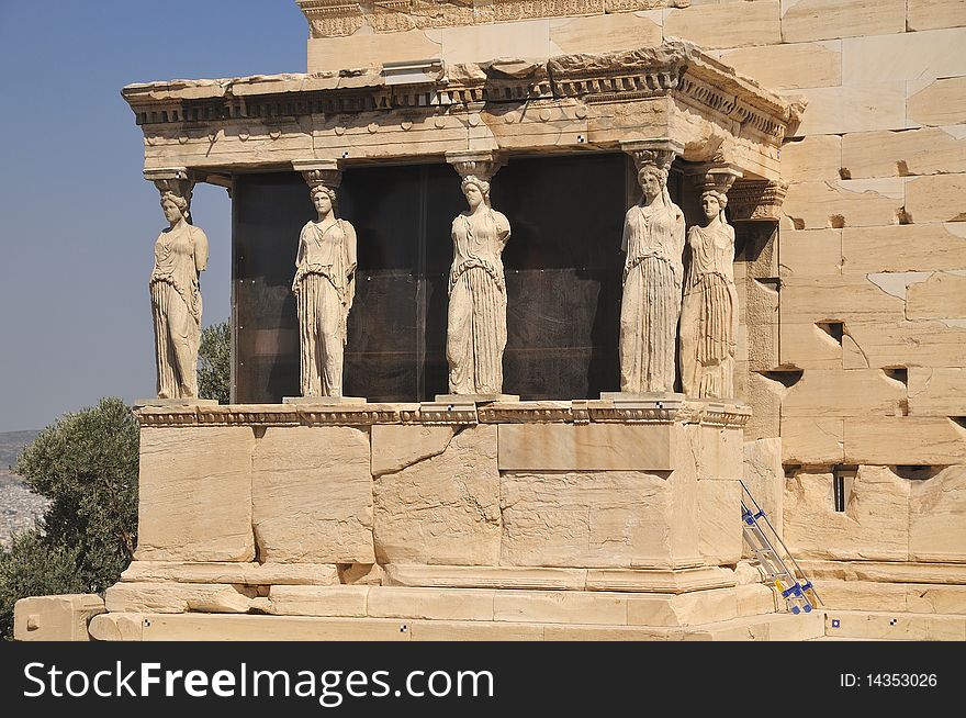 Caryatids Erechtheion temple Athens and Poseydon on Acropolis in Athens