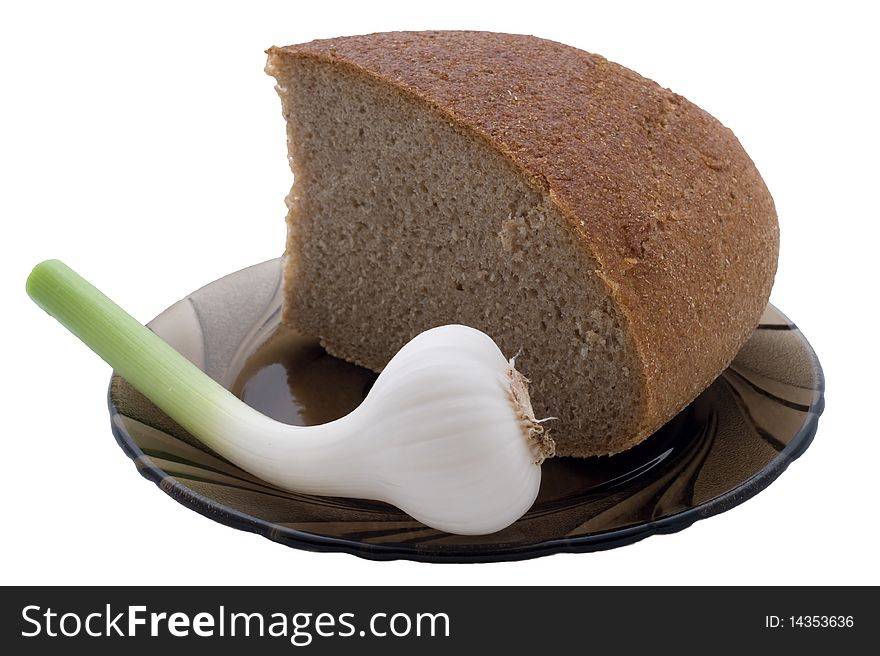 The bread and garlic on plate