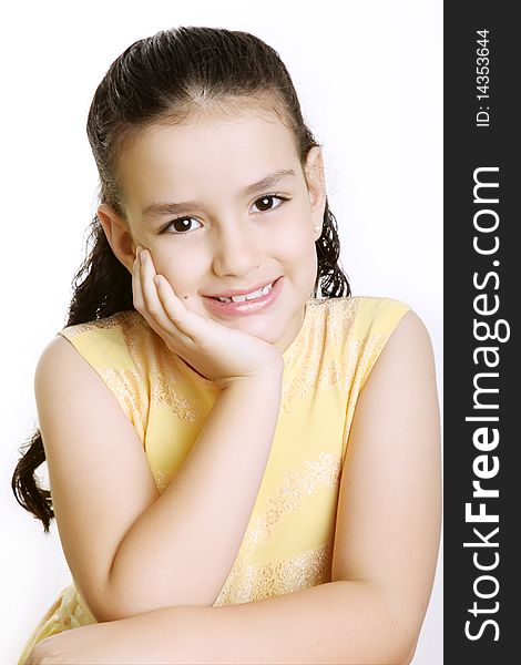 Girl smiling and looking at the camera, Over white background. Girl smiling and looking at the camera, Over white background