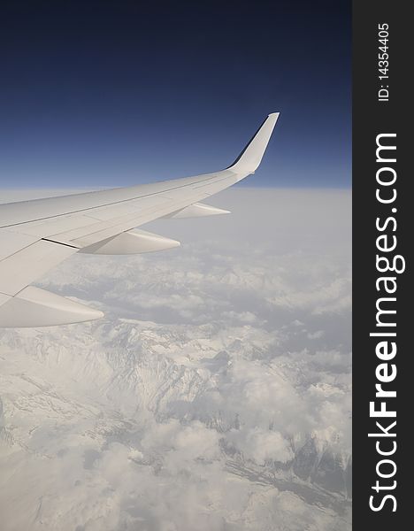 Airplane , flying over Switzerland (Alps)