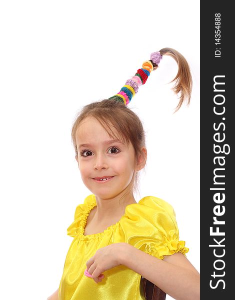 The girl with an unusual hairdress on a white background. The girl with an unusual hairdress on a white background