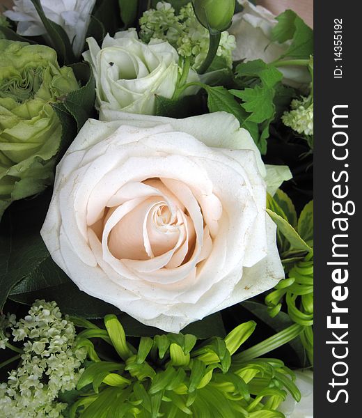 Beautiful bouquet of white roses and assorted flowers