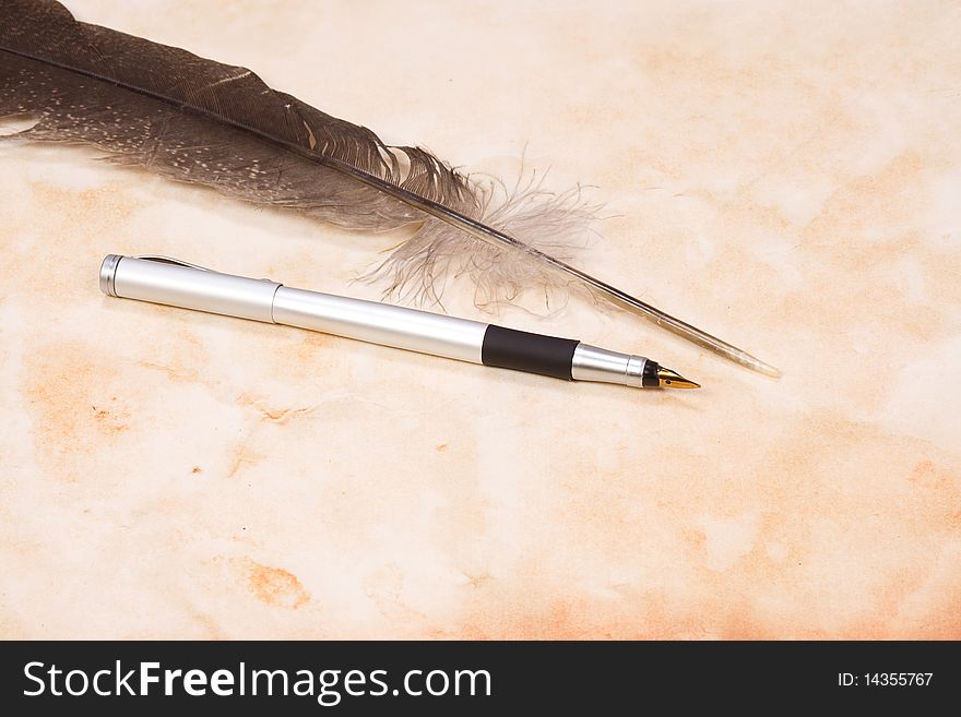 Feather And Silver Pen