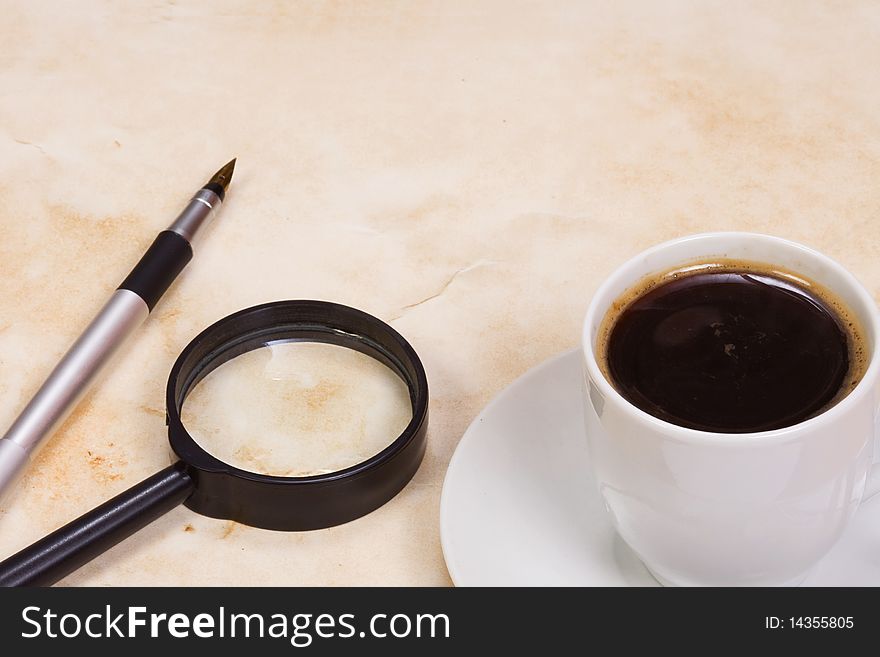 Magnifying Glass And Coffee