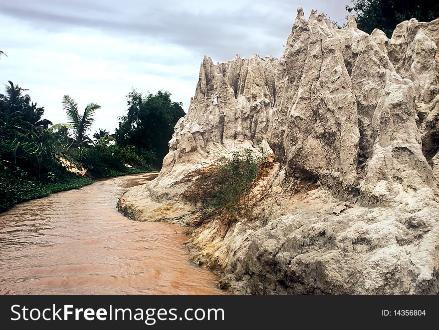 Pinnacles next to a small river in Vietnam. Pinnacles next to a small river in Vietnam