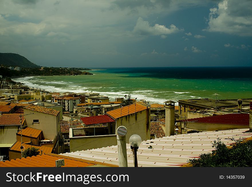 View on Cefalu town near the ocean in Sicily, Italy. View on Cefalu town near the ocean in Sicily, Italy