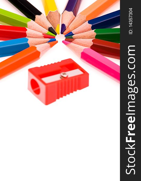Multicolor pencils and red sharpener