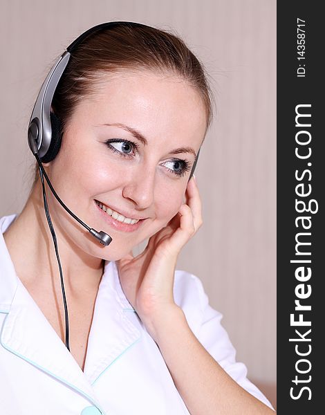 Close-up face of smiling woman in headphones