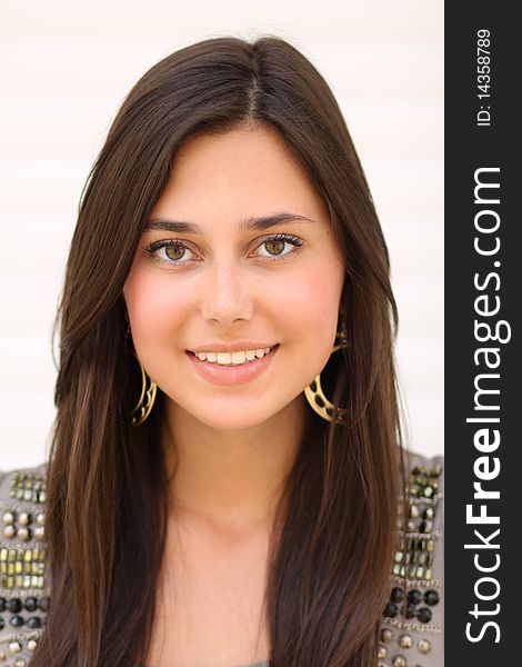 Portrait of young happy smiling woman, isolated on white