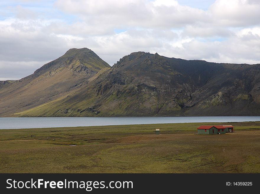 Iceland landscape with refuge huts near Alftavatn lake. Iceland landscape with refuge huts near Alftavatn lake.