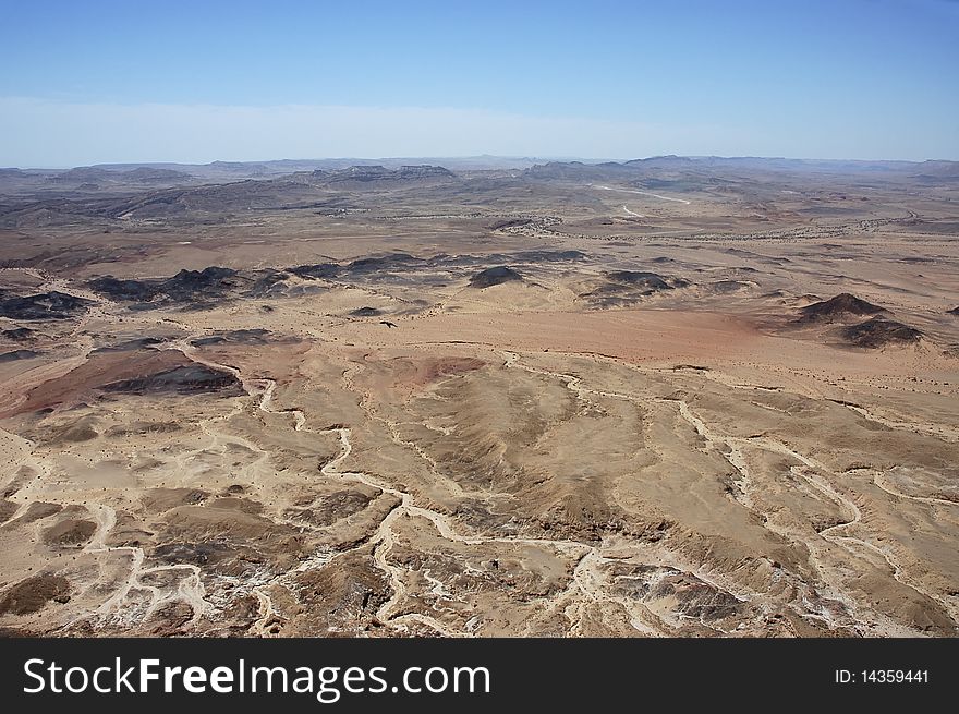 Aerial view of Ramon Crater from Ardon mountain in Negev desert, Israel.