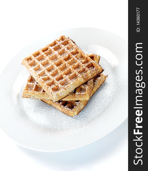 Breakfast waffles isolated against a white background