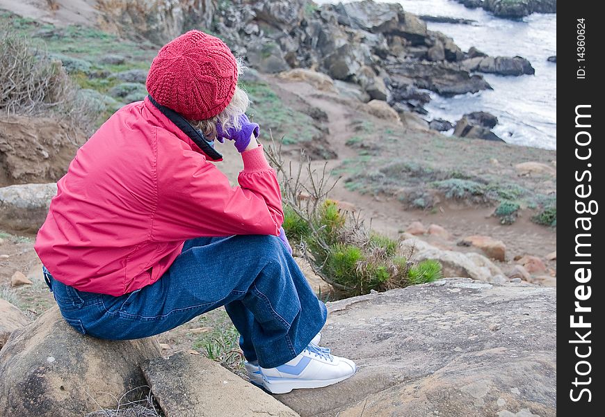 Woman Looking Out to Sea