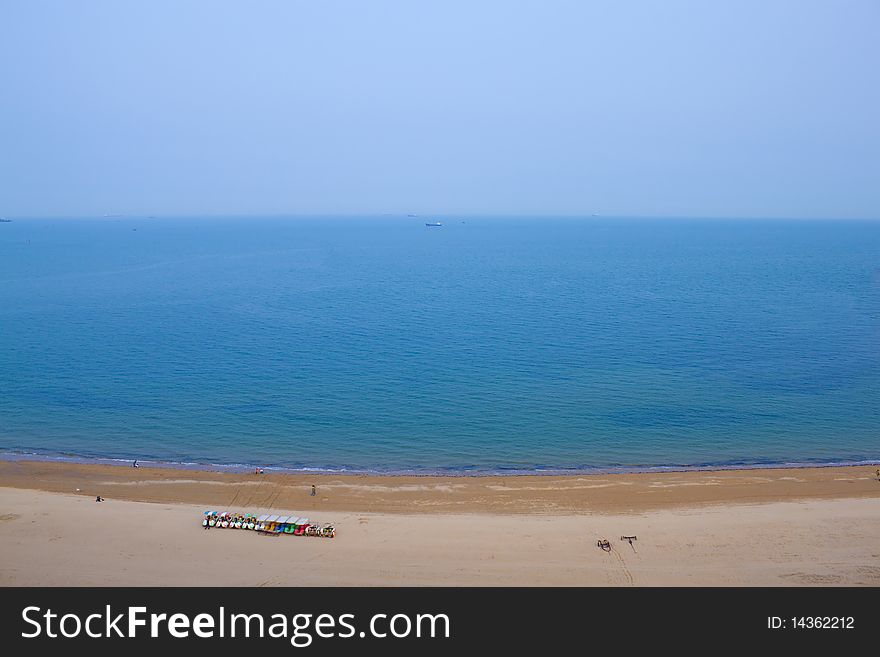 Under the blue sky, blue sea and clean beach with one goal consisting of a. Under the blue sky, blue sea and clean beach with one goal consisting of a