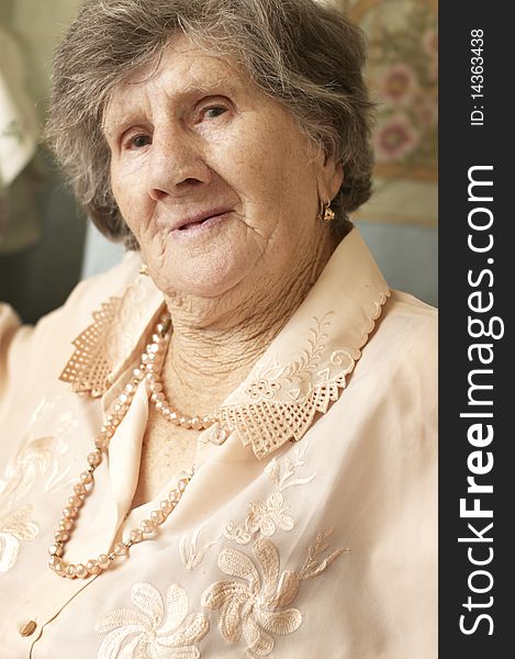Smiling woman in age of 85 years