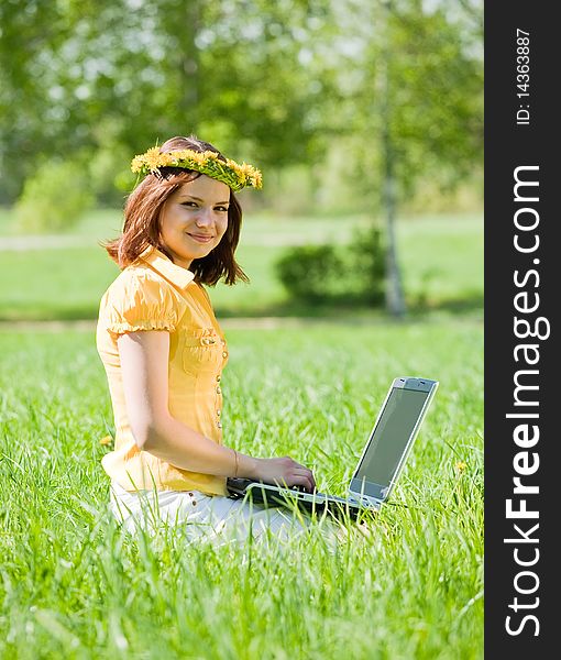 Girl with laptop outdoor