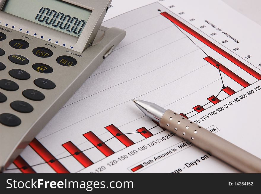 Calculator, Pen And Business Chart