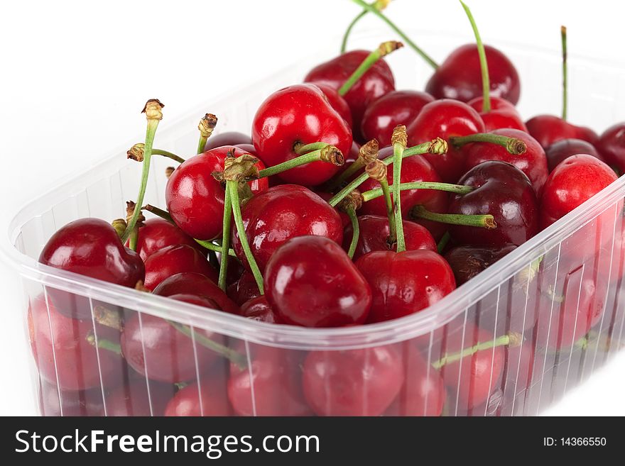 Cherry, close up of fresh fruit against white background
