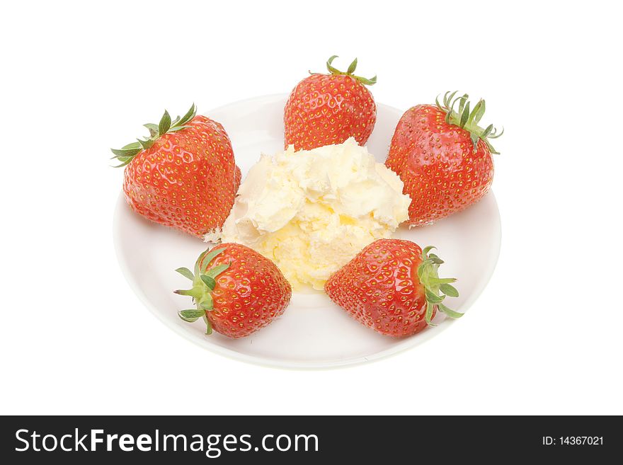 Strawberries and clotted cream on a plate. Strawberries and clotted cream on a plate
