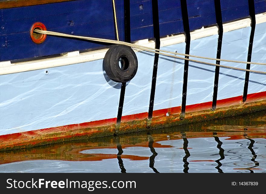 Reflection on the water of a ship at anchor. Reflection on the water of a ship at anchor
