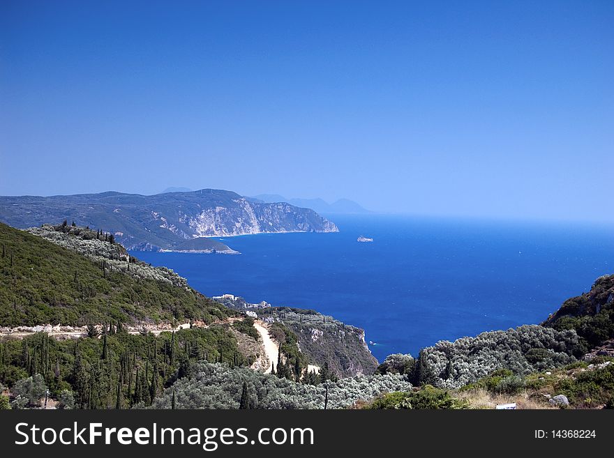 Beautiful bay with clear blue sea and sky, Corfu, Greece