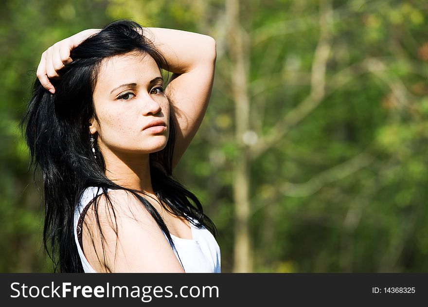 Portrait of brunette girl outside. Portrait of brunette girl outside