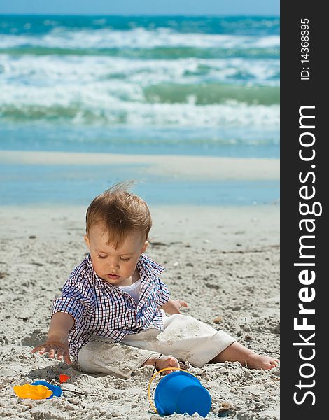 Child playing on a beach. Child playing on a beach