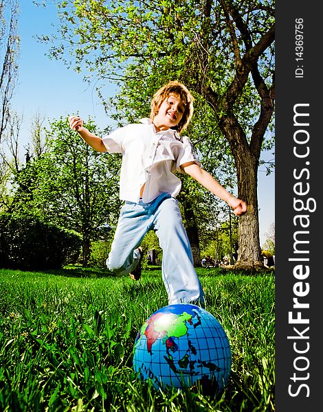 Cheerful boy with ball on walk. Cheerful boy with ball on walk