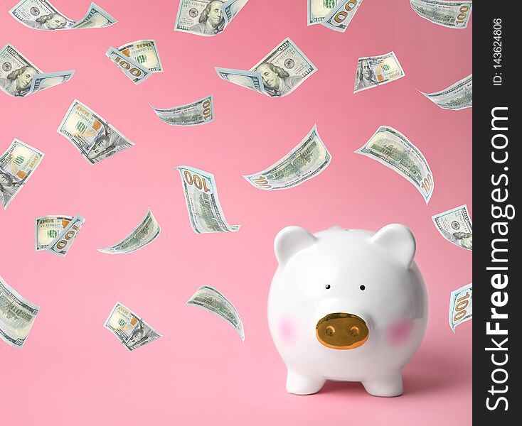 White piggy bank on color background. Money saving