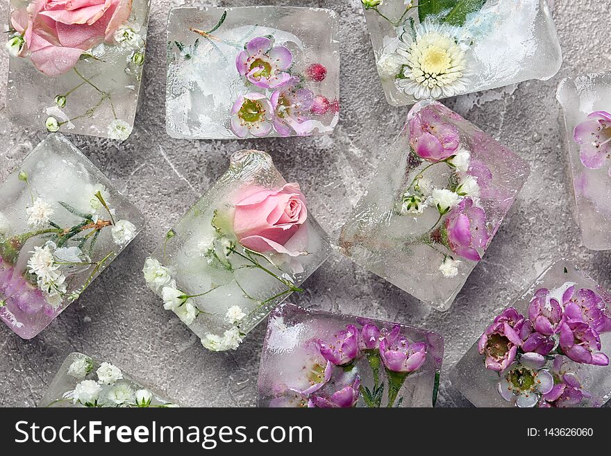 Floral ice cubes on table