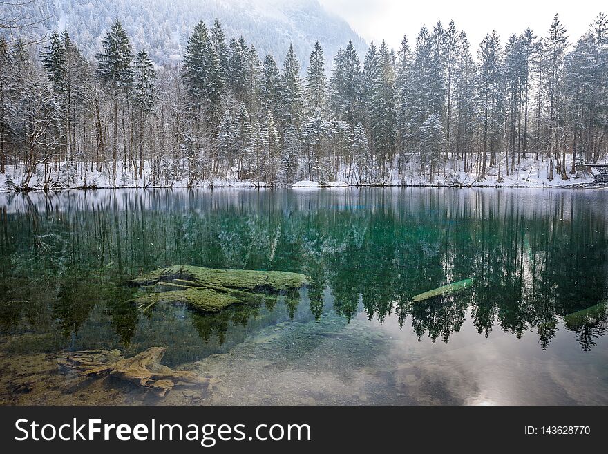 Lake Christlessee in winter at trettach valley near oberstdorf, idyllic south bavarian landscape in Germany