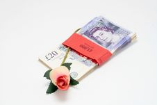 20 Pound Notes With Red Roses Royalty Free Stock Photography