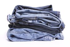Stack Of Folded Blue Jeans Stock Images