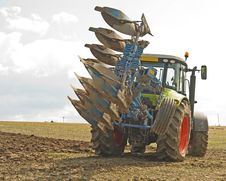 Tractor Turning With A Raised Plow. Royalty Free Stock Image Tractor Turning With A Raised Plow. Royalty Free Stock Image