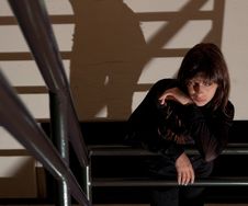 Woman Waiting In Stairwell Stock Photography Woman Waiting In Stairwell Stock Photography