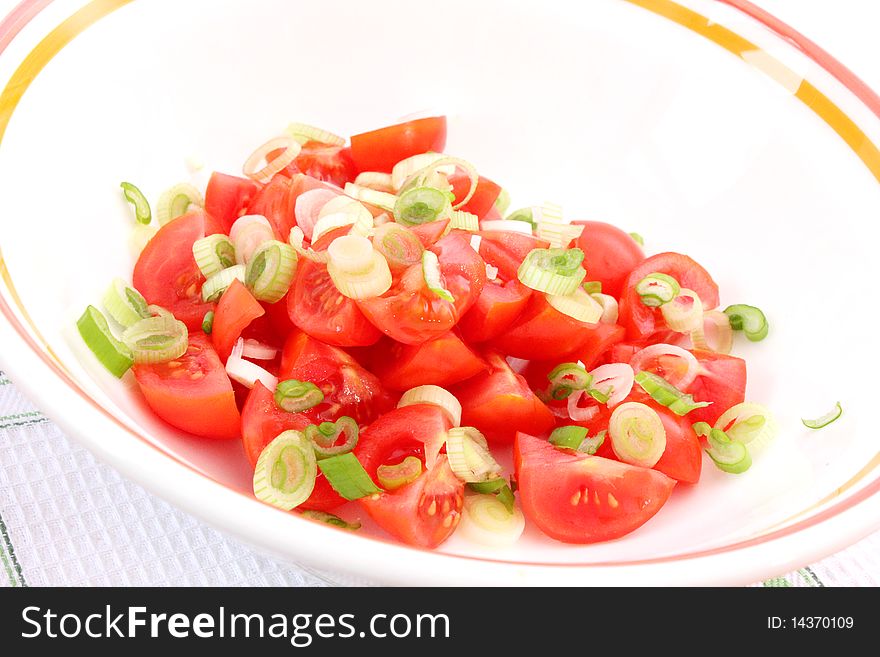 Salad of tomatoes with springonions