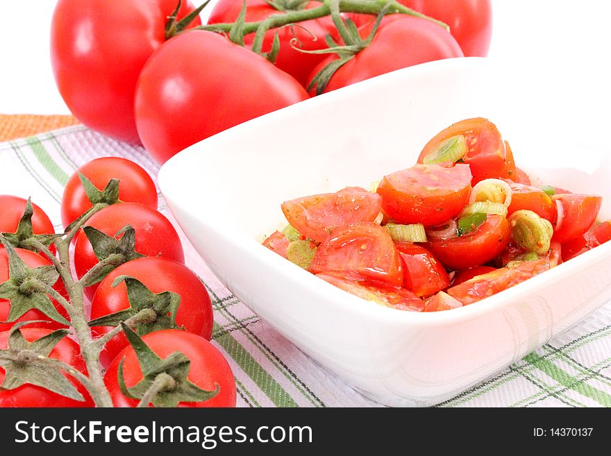 Salad of tomatoes with springonions