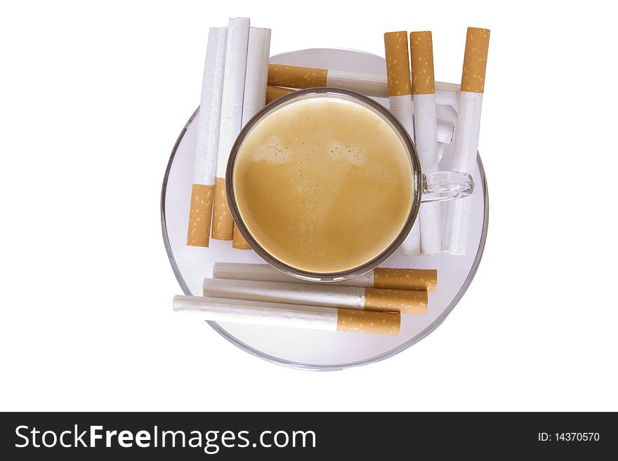 Cup with a saucer both coffee grains and cigarettes