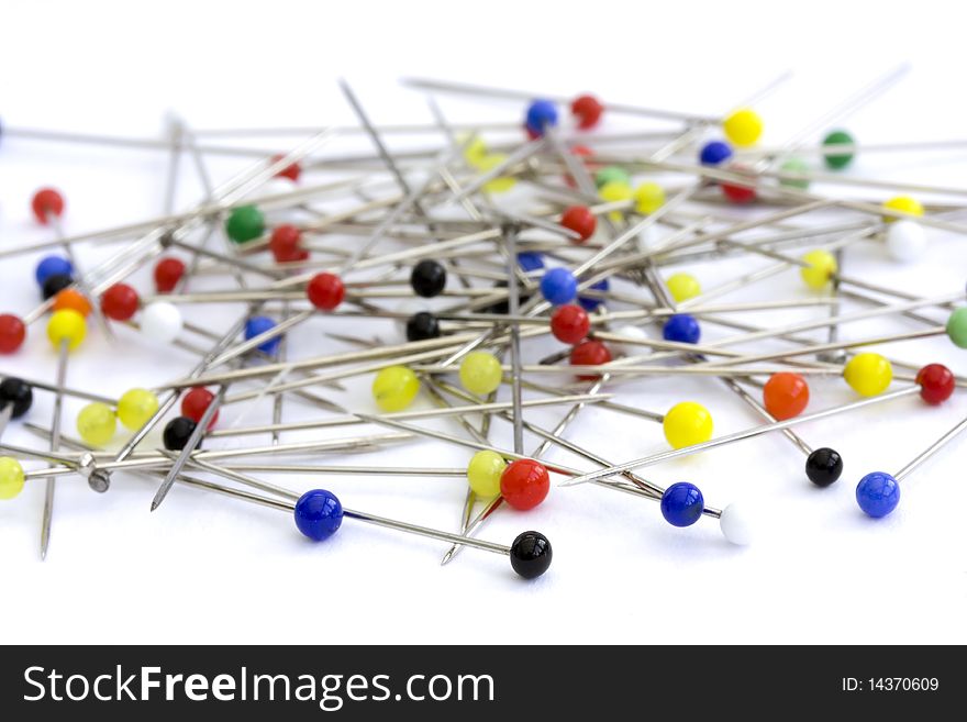 Pins on a white background