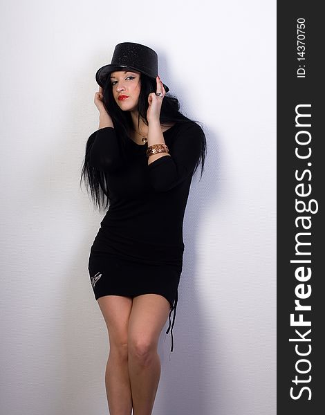 Beautiful sexy girl in black hat