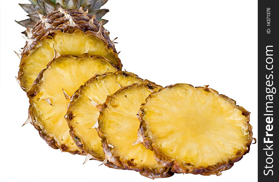 Tasty And Ripe Pineapple Slices Over The White Bac