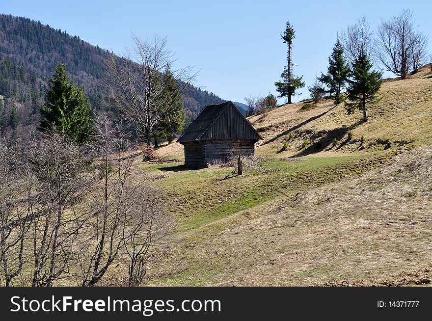 Cottage for rest after work on a vegetable garden in mountains