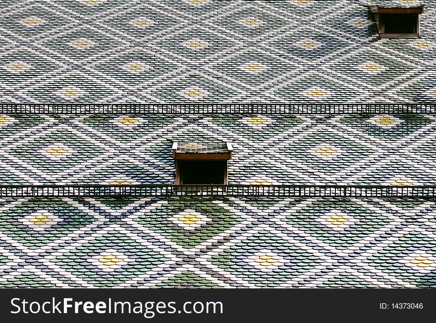 Roof pattern of the main church of Bolzano, beautiful city located in the region of Alto Adige (Italy)