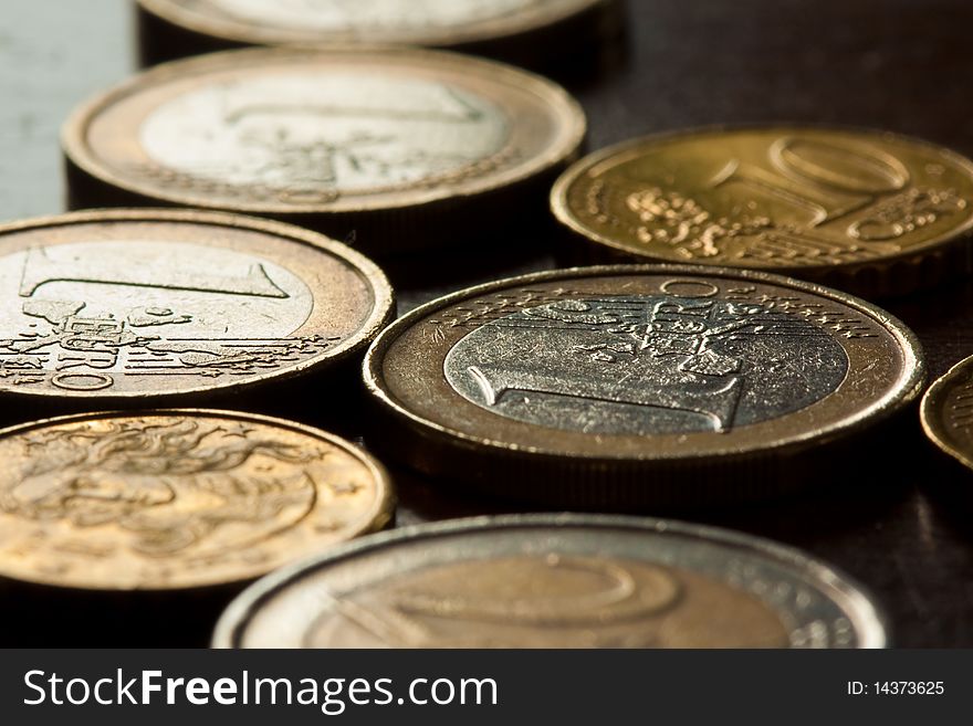 Euro coins on table in macro